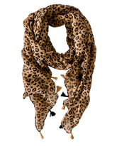 Elevate your style with our lightweight beige and black cheetah pattern scarf, perfect for all seasons. The bold cheetah print adds an edgy touch to any outfit, complemented by the neutral beige and black color combination that pairs effortlessly with various styles. Playful tassels on each end provide a fun accent, and the generous 185 x 90cm size allows for versatile styling options.